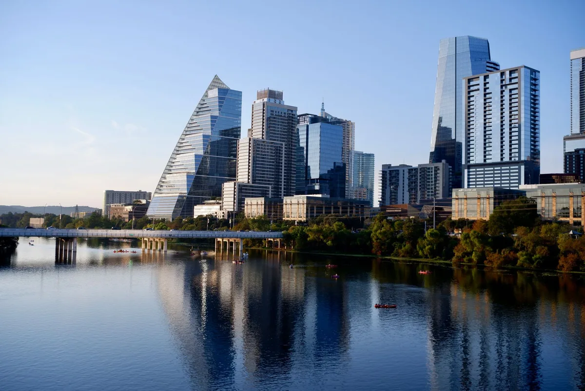 Downtown Austin, Texas skyline reflected in Lady Bird Lake on a clear day