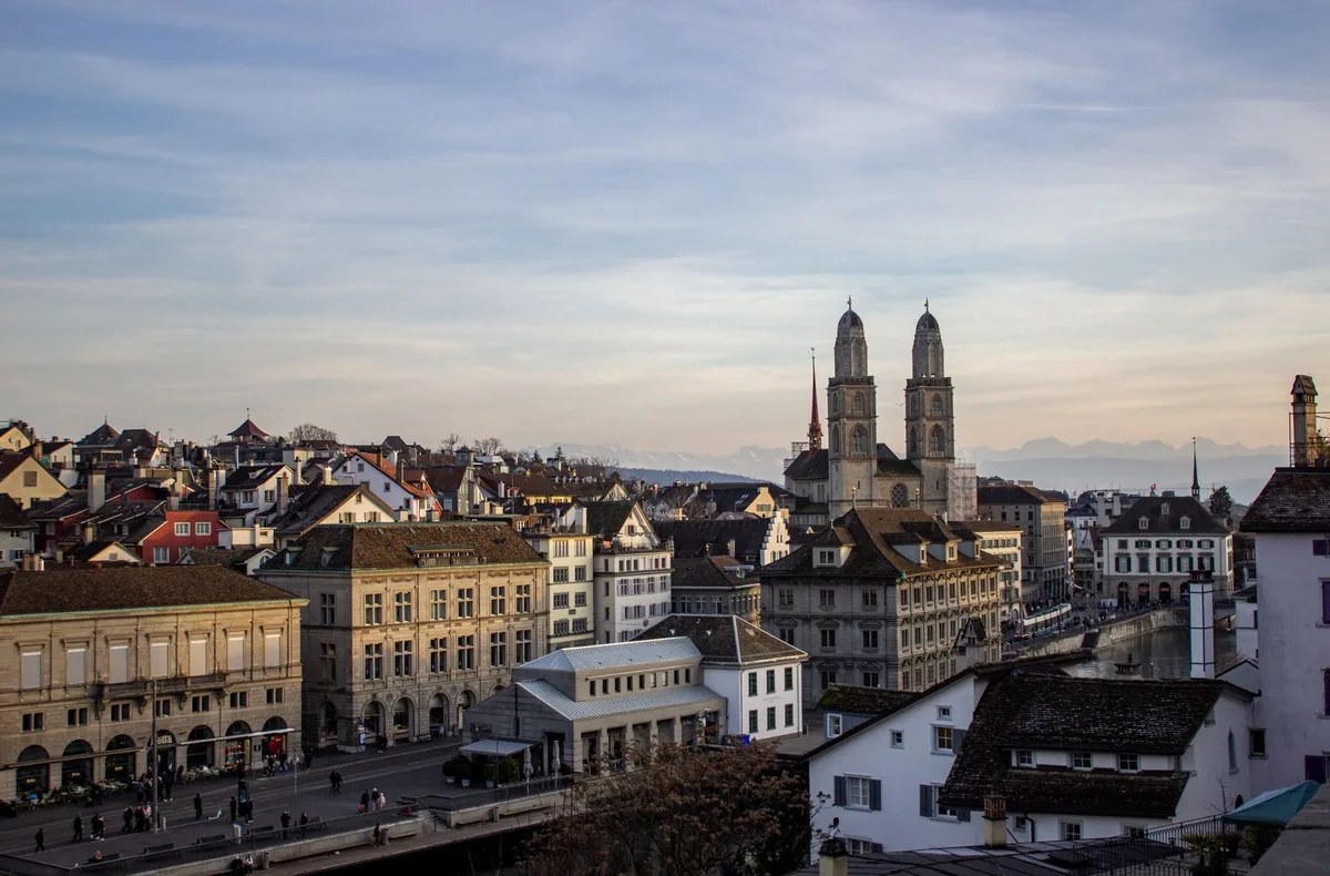 Zurich old town skyline with the Grossmünster twin towers above the Limmat river, Switzerland